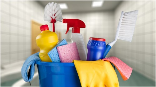 Carpet cleaner preparing equipment with safety checks before work